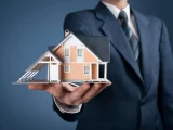 Real estate agent offer house represented by model
